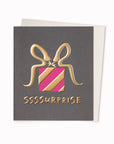 SSSSurprise Greeting Card is a wrapped up parcel with gold ribbon inspired celebratory card featuring artwork by artist and screen printer, David Newton.