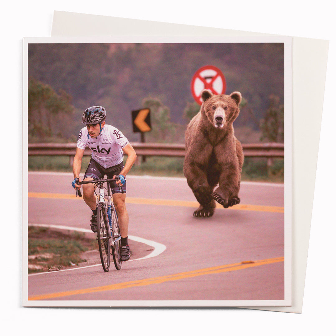 Bear Chasing cyclist is part of USTUDIO Design's 1000 Words range - a 'slice of life' licensed photography collection with a focus on humour and sometimes with a little digital manipulation to help the fun along.