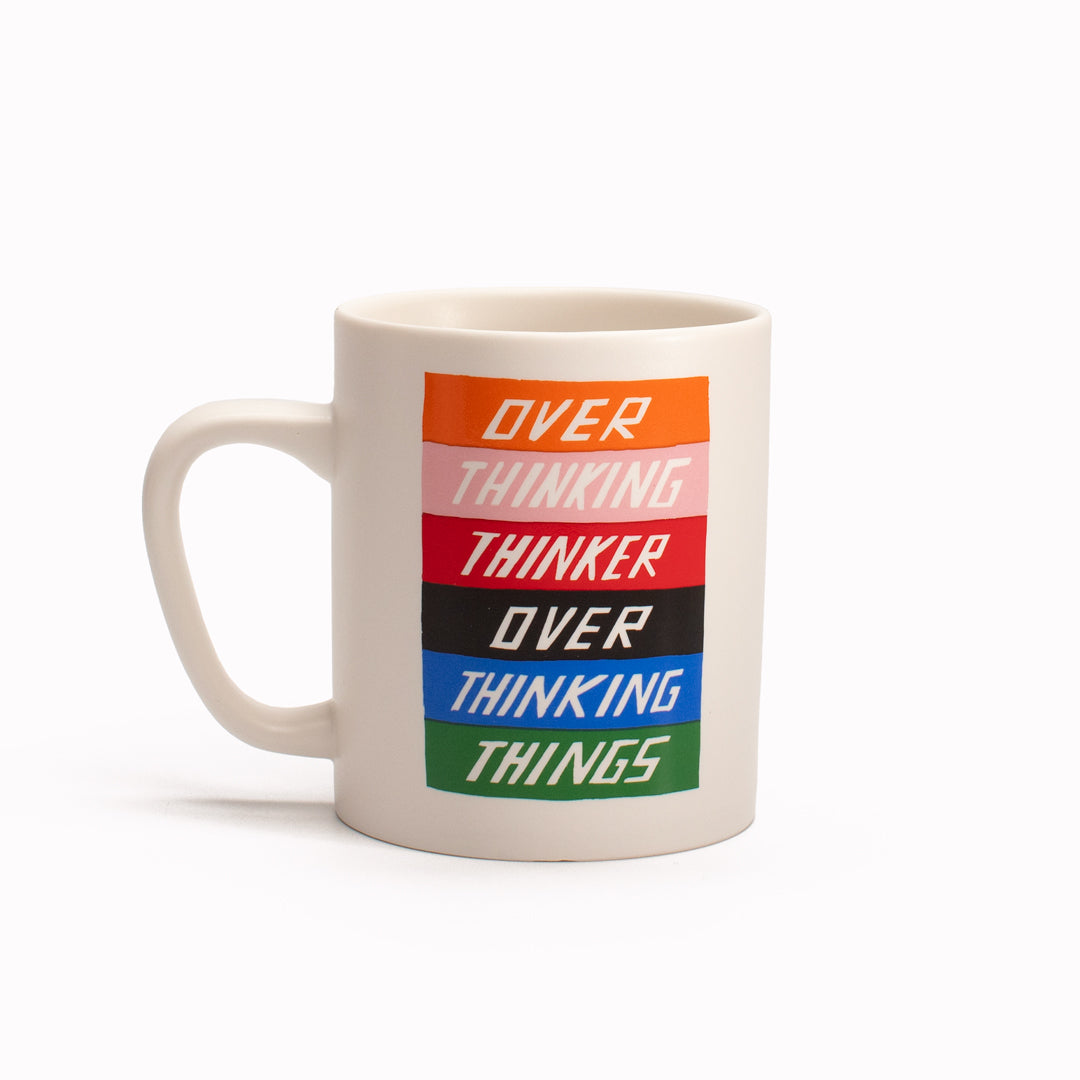 'Over Thinking Thinker Over Thinking Things' stoneware mug by artist Scott Patt for USTUDIO Design. A bright and colourful statement mug for the thinkers, the introverts or the anxious.