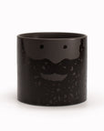 'Beardy Bernard' is a black plant pot with a great marker pen cartoon beardy decal face. Made of glazed stoneware so entirely watertight, you can plant a small houseplant inside where the leaves will hang over as 'foliage' hairstyle.