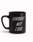 'Seriously Not Cool' stoneware mug by artist Scott Patt for USTUDIO Design. A graphic, monochrome mug with a relatable sardonic statement.